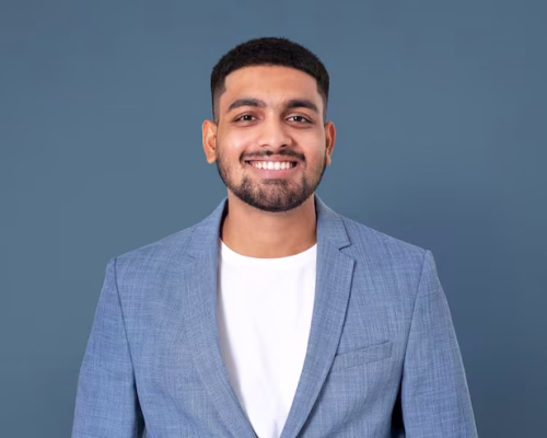 cheerful-indian-businessman-smiling-closeup-portrait-jobs-career-campaign_53876-129417